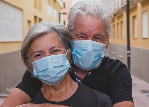 Couple wearing masks after COVID-19 testing