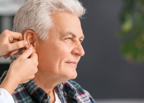 Older man with an ear infection