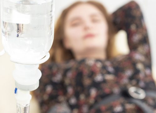 Woman getting IV therapy