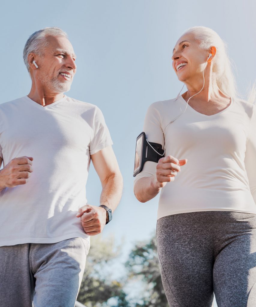Older couple getting exercise outside